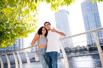 Poster - Photo of attractive cheerful tender couple thumbs up enjoying resting trip journey free time on fresh air outdoors