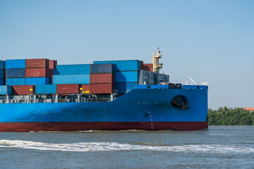 Wall Mural - Container cargo ship, import export commerce business trade logistic and transportation of International by container cargo ship boat in the open sea, freight shipping maritime.
