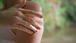 © stockbusters - Woman hand touching skin tropical resort closeup. Model running fingers at arm