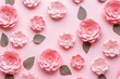  a bunch of pink paper flowers on a pink background with leaves and flowers cut out of them to look like they have been cut out of paper for a story.