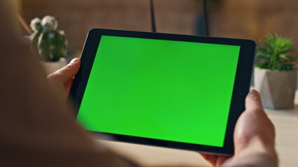 Wall Mural - freelancer hands holding tablet working remote at home close up. mockup monitor