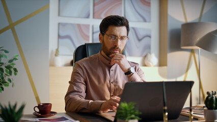 Wall Mural - Business man working office looking on laptop close up. Manager thinking job