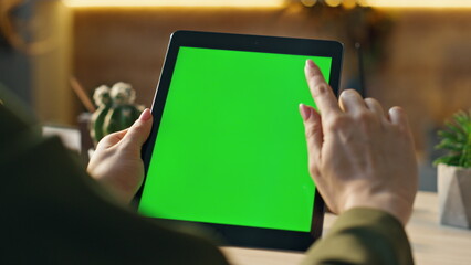 Wall Mural - mockup tablet worker scrolling display browsing social media at office close up.