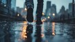 A person walking in the rain on a city street. Suitable for urban lifestyle and weather-related concepts