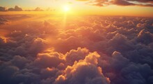  The Sun Shines Brightly Through The Clouds Above The Clouds In The Sky As Seen From The Window Of A Plane On The Way To The Island Of The Sun.