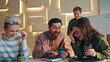 Colleagues laughing coffee break in workspace closeup. Friendly communication