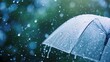 © Khalif - Transparent umbrella under heavy rain against water drops splash background. Rainy weather concept.