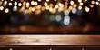Wood table with chalkboard and blurred restaurant lights background, ideal for photo montage or product display and placing items.