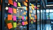 © ArtBox - Colorful sticky notes on glass of meeting room