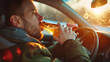 Man drinking alcohol while driving in his car