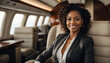 Portrait of a african american business woman sitting in private jet seat