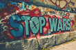 © Kristijan - Stop Wars graffiti on a wall