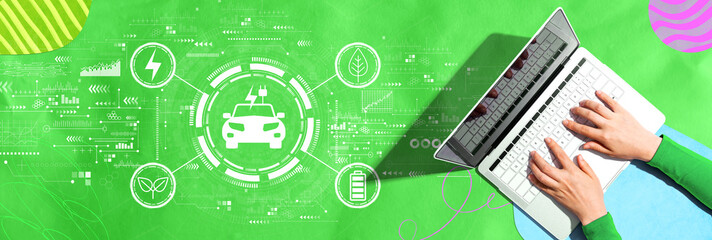 Poster - EV concept with person using a laptop computer