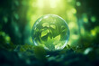 Earth Day concept, environmental green sphere background with leaves and leafy branches, World Environment Day, environmental conservation concept, glass globe, green background