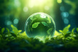 Earth Day concept, environmental green sphere background with leaves and leafy branches, World Environment Day, Environmental Conservation Concept, Glass Globe