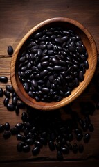 Wall Mural - Black beans on wooden background. Black beans food.
