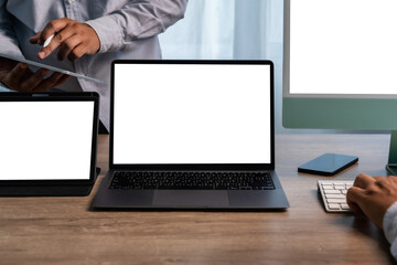 Poster - man hands and laptop with blank screen mock up using laptop computer modern sitting at office