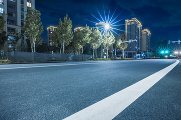Wall Mural - New asphalt road and cityscape at night