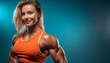 © SashaMagic - A strong female bodybuilder poses in an orange tank top.