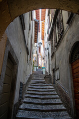 Wall Mural - Bellagio city narrow alley with cobbled steps in Lake Como italy