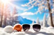 Sunglasses on bright winter snow, travel theme