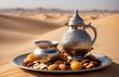 Silver Arabic Jug With Glass, Dry Fruits On Plate Against Sand Dune