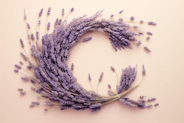 Wall Mural - 
Artwork of the letter C formed from delicate lavender threads, giving a sense of depth and texture, set against a pale yellow background