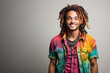 © ImagineStock - handsome young African-American man with dreadlocks and colorful shirt on a gray background. ai generated