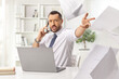 © Ljupco Smokovski - Angry boss at a desk throwing papers and making a phone call
