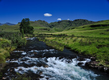 Landscape Of The Pholela River At Cobham Nature Reserve With The Maluti Mountain Range.