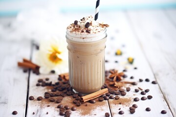 Wall Mural - frozen coffee shake with coffee bean toppings, closeup shot