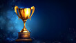 © Oksana - Golden trophy cup with  stars isolated on dark blue background with copy space for text