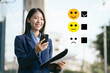 © NINENII - Happy Client customer experience concept. Woman recording phone inquiry with checkboxes, smiling face rating excellent for satisfaction survey.