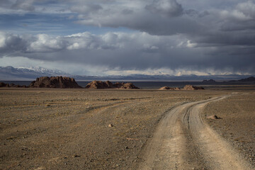 Sticker - A road in the steppe overlooking the mountains in Mongolia.