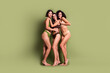 © deagreez - Full length studio photo of sweet shiny women wear lingerie no filter skin hugging isolated pastel khaki color background