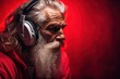 Handsome senior man listening to music with headphones on color background. Hipster. Music Streaming Service Concept with Copy Space.