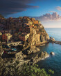 Manarola village, rocks and sea. Cinque Terre, Italy.