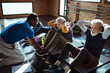 © Davor - Diverse senior people working out with trainer in gym