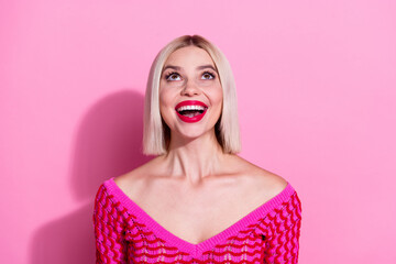 Wall Mural - Photo of impressed pretty person open mouth look interested up empty space isolated on pink color background