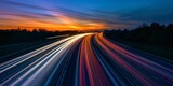 Fototapeta Do przedpokoju - traffic light speed trails on the motorway Generative AI