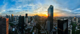 Fototapeta Miasta - Panoramic view of jakarta City, Indonesia, with beautiful sunset. Jakarta is the largest city in indonesia that also the center of governance and business district. 