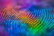 Fingerprint over computerized DNA strands. Colored ink fingerprint, top view. Glitchy Speckled Light Trails. Rainbow colors