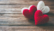 Valentine's Day Handicraft. Knitted Hearts Wallpaper.