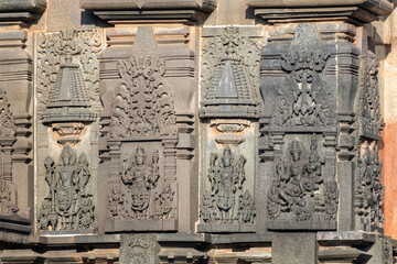 Poster - Ornate carvings of a Hindu deities at the ancient Hoysala era Chennakeshava temple in Belur, Karnataka.