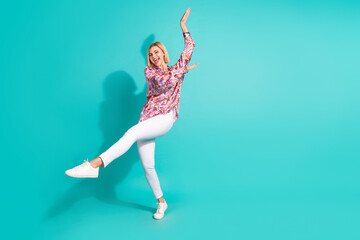 Sticker - Full size photo of cute girl wear oversize shirt white trousers dancing celebrate black friday isolated on turquoise color background