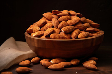 Wall Mural - Close up of Almond snack fruit in wooden bowl.