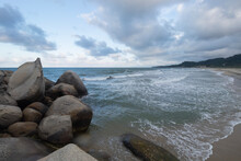 Beautiful Shore Big Rocks With Blue Caribbean Sea In Blue Dawn Beach Landscape