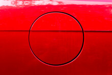 Close-up Of The Round Fuel Tank Cap Of A Red Car.