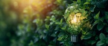 Renewable Energy And Sustainable Living Symbolized By An Ecofriendly Lightbulb Made Of Leaves. Сoncept Solar Power, Wind Energy, Sustainable Lifestyle, Green Living, Renewable Resources