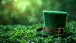 Green hat with shamrock or clover leaves on a green background. St. Patrick's Day background